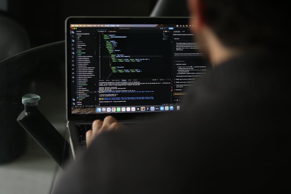 A digital screen displaying lines of HTML and CSS code in various colors, including yellow, red, blue, and white, against a dark background. The code comprises tags, attributes, and URL paths, with so
